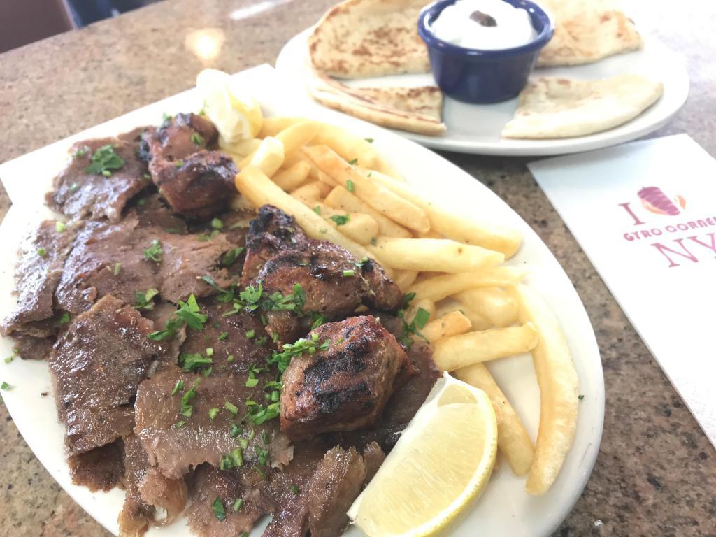 Gyro Souvlaki Combo · Served with a side salad, one pita bread, one small tzatziki also your choice of lemon potatoes, rice, fries, or peas w carrots. 