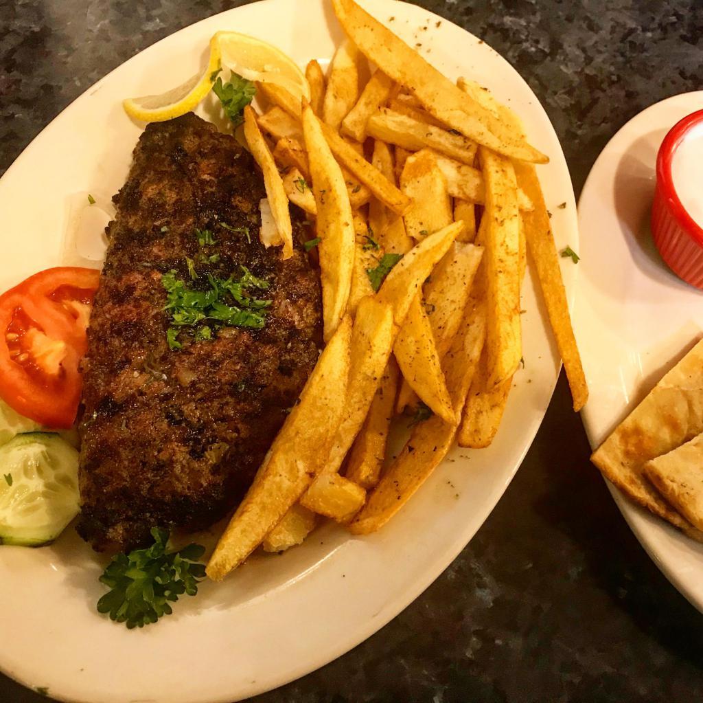 Stuffed beef bifteki platter with feta cheese · Served with a side salad, one pita bread, one small tzatziki also your choice of lemon potatoes, rice, fries, or peas w carrots. 