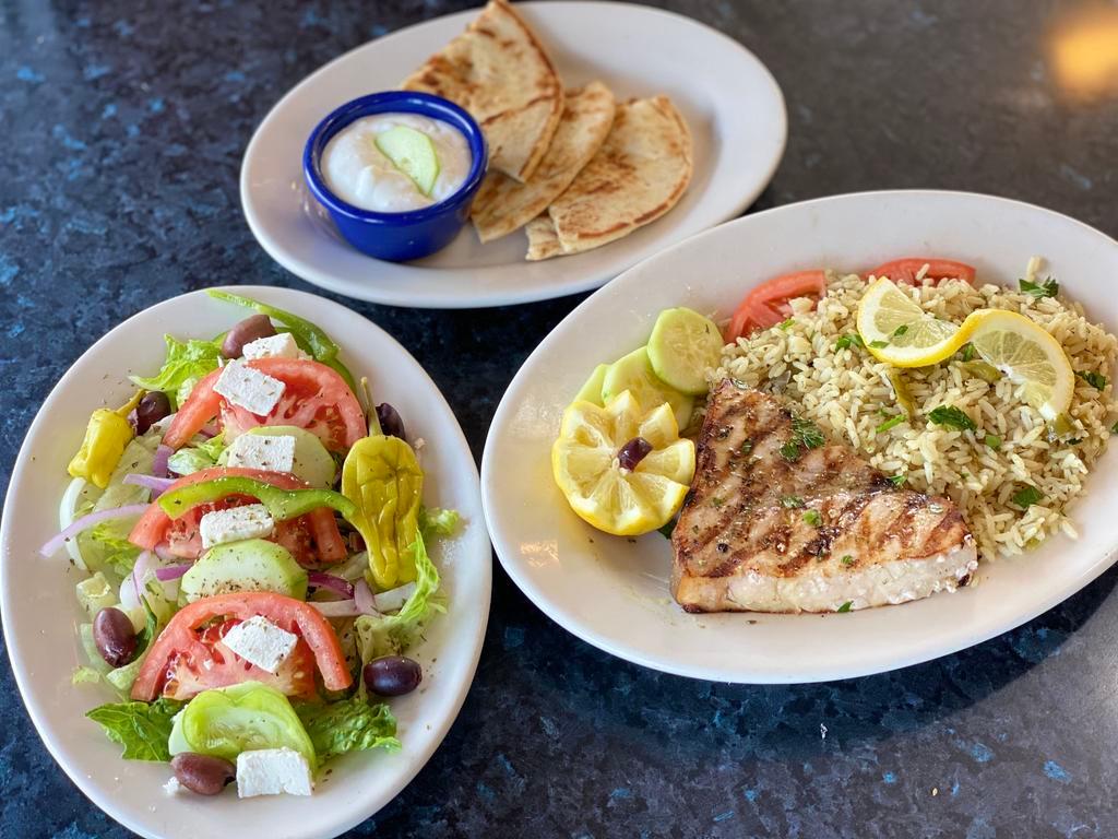 Swordfish steak platter  · Charcoal sword fish steak served with a Greek salad and a choice of rice or lemon potatoes 