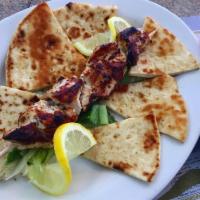 Chicken Kebab stick · Cubbed chicken stick. Served with one pita bread, and one small tzatziki 