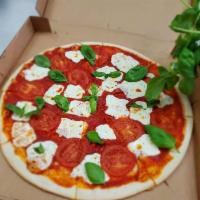 Pizza Margherita · Tomato sauce, oregano, mozzarella and fresh basil. Vegetarian.