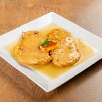 Chicken Francese · Breast of chicken lightly battered and sauteed in lemon, butter and white wine. 