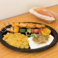 Kebab Plate · Choose 2 kebabs and 2 entree sides. Served with your choice of white, whole wheat, or gluten...