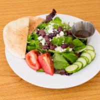 Greek Salad · Mixed greens with feta, Kalamata olives, cucumbers and tomato with pita and housemade balsam...