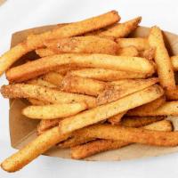 Spicy Fries · French fries tossed in a spicy seasoning blend. Vegan.