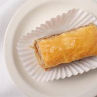 Baklava · Traditional layered dessert with spices and walnuts, sweetened with agave and maple syrup. V...