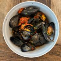Cozze in Pomodoro · Mussels drenched in our Famous Tomato Sauce