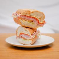 Italian Roll Sandwich · Salami, pepperoni, ham, provolone, lettuce, tomato, onion, oil, and vinegar.