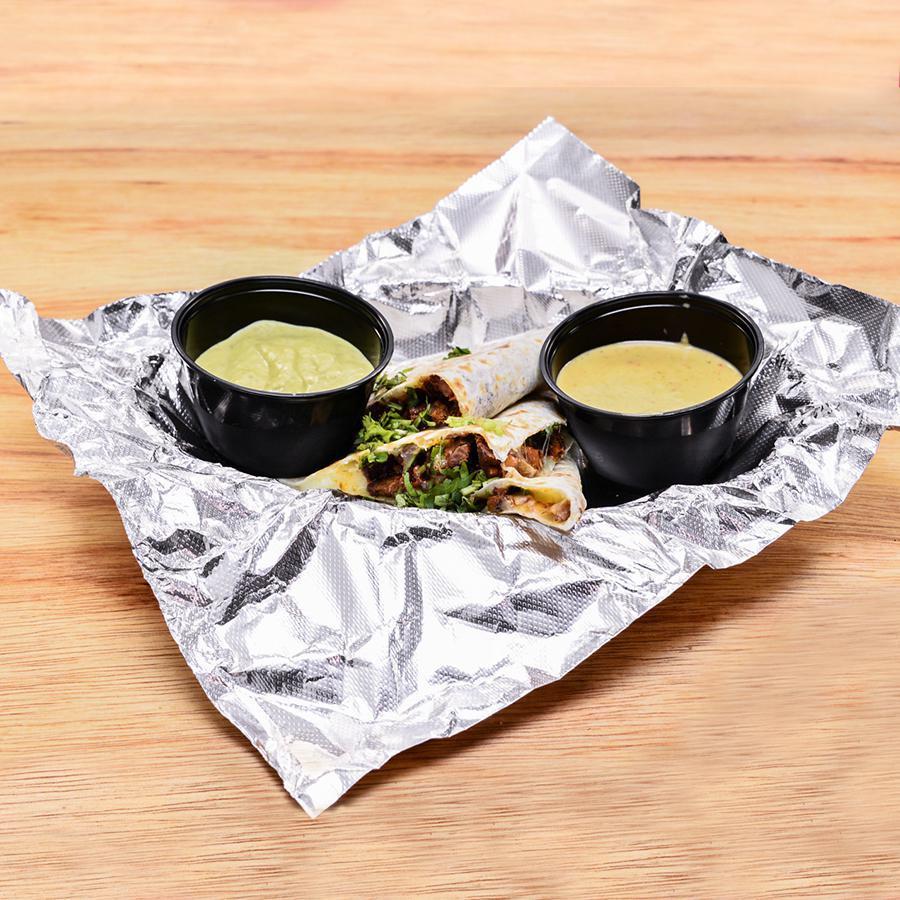Quesadilla · Flour tortilla filled with cheese and your choice of protein. Comes with 2 sauces for dipping.