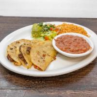 Quesadillas · Two flour tortilla filled with melted Monterrey jack cheese and your choice of meat. With gu...
