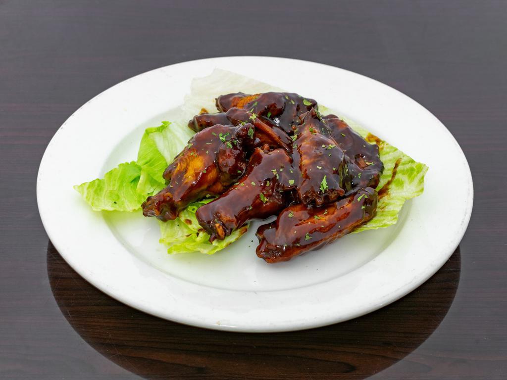 Henni Wings  ONLY · Cooked wing of a chicken coated in sauce or seasoning.