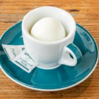 Hard Boiled Egg · Perfectly boiled egg served with your choice of salt or pepper.