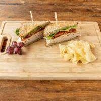 The Unexplained Bacon · One of our signature lunch sandwiches. Comes with your choice of bread, turkey, bacon, swiss...