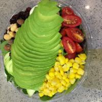 Avocado Veggie Salad · Organic spring mix, avocado, egg, tomato, corn, cucumber, dried cranberry and nuts. Vegetari...