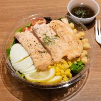 Grilled Salmon Salad · Organic spring mix, grilled salmon, egg, cherry tomato, corn and chickpeas.