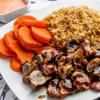 Steak Hibachi Dinner · Served with  fried rice, sweet carrots, mushroom and house salad.