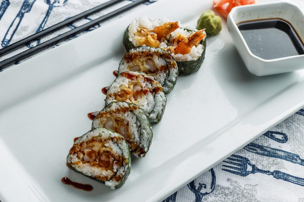 Shrimp Tempura Roll · 2 pieces of deep fried shrimp and top with eel sauce. All cooked, no raw fish.