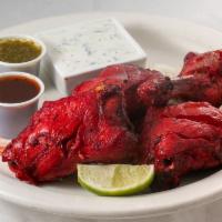Chicken Tikka · Tender boneless chicken breast marinated in fresh spices, herbs, and yogurt, barbecued on a ...