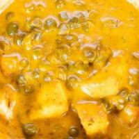 Matar Paneer · Homemade soft cheese cooked with peas and Indian spices, ginger, & garlic paste. Served with...