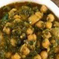 Palak Channa ( V) · Spinach and Channa (Chick Peas) curry in Indian spices and herbs. Served with Basmati rice.