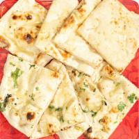 Garlic Nan · White bread baked in tandoor and topped with garlic