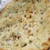 Onion Naan · White bread baked in tandoor stuffed with onions