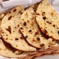 Tandoori Roti (V) · Round shaped whole wheat soft bread baked in tandoor