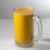 Mango Lassi · Homemade yogurt drink mixed with mango pulp
