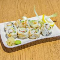 Yoshi Roll · Double crabstick, bacon, mayo, cucumber, avocado, and cream cheese, rolled in onion crunchies.
