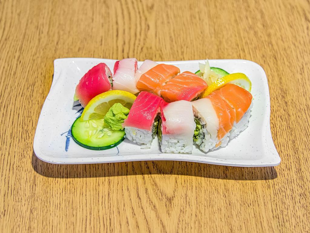 Luna Roll · A california roll topped with tuna, salmon, and escolar.