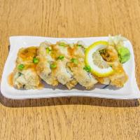 Crab Rangoon Roll  · Tempura’d roll with crabstick, cream cheese, and scallions, topped with sweet chili sauce