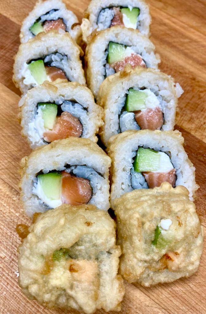 Philly Roll  · Tempura’d roll with salmon, cream cheese, and cucumber.