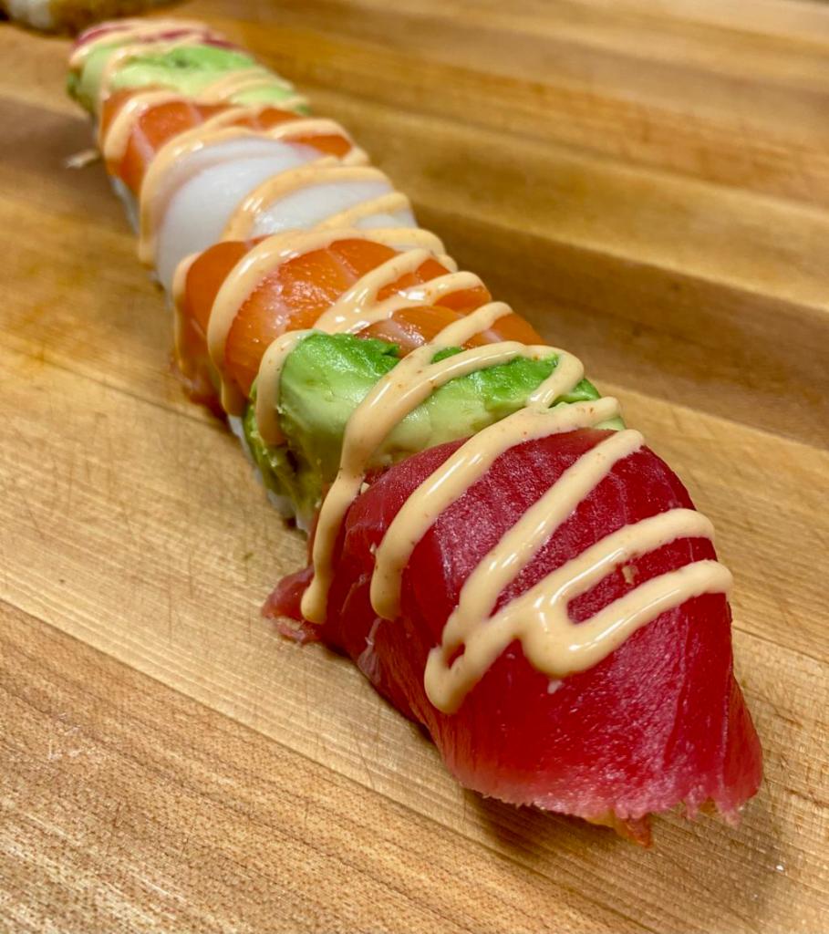 Date Night Roll · Tempuras shrimp, cucumber, avocado,mayo, topped with avocado, tuna, salmon, escolar, and spicy mayo.
