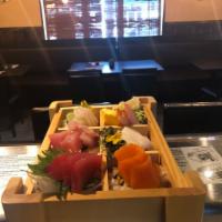 Chirashi · 13 piece assorted raw fish, egg and oshinko with bonito rice.