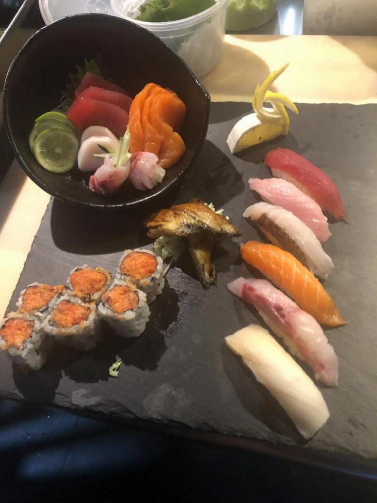 Sushi Sashimi for One · 12 piece sashimi and 6 piece sushi with spicy tuna roll.