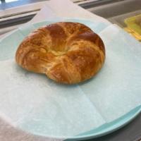 Plain Croissant  · Served on a flaky French pastry. 