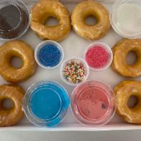 Glazed yeast donut kit · Includes 6 glazed donuts, 3 sprinkles, and 3 icings
