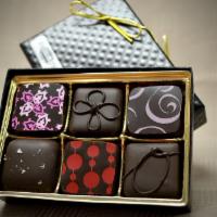 6 Piece Box · An assorted box of truffles and confections.