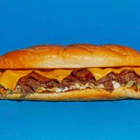 Bacon Ranch Cheesesteak · Sliced steak with melted cheddar, crispy bacon, and creamy ranch on a hoagie roll.