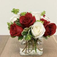 Hug · 3 red roses and 3 white roses in glass vase