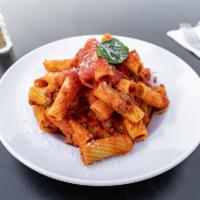 Rigatoni Bolognese · Tube shaped pasta. Meat sauce.