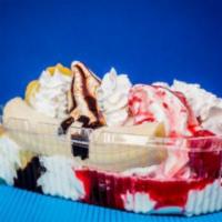 Banana Split · Vanilla Ice cream topped with Chocolate, Strawberry, Pineapple, Whipped Cream, and nuts