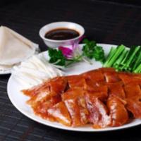Peking Duck  （Whole） · Include ：Whole cut Peking duck；10pcs Lotus leaf pancake；Cucumber；Shallot；Sauce
