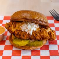 Bird in a Bun · Nashville style hot chicken seasoned and brined to perfection, in a brioche bun. Served with...