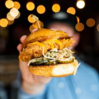 Sando (Served with Fly Bird fries). · Fried chicken, slaw, ginger pickles, fly sauce, on a brioche bun.  Choose ORIGINAL fried chi...