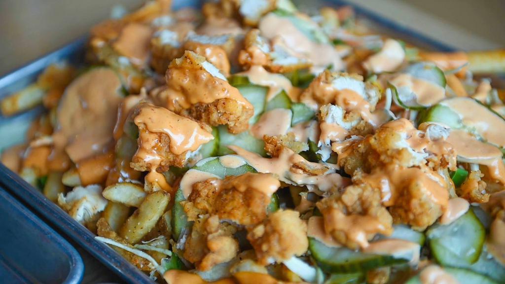 Loaded Fries · Fries, tendeez, slaw, ginger pickles, fly sauce.  Choose ORIGINAL fried chicken or DUNKS  (a hot dip in a spicy-tangy-Nashville Hot style sauce with an Asian twist)!