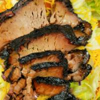 Brisket Salad · Our house salad topped with finely sliced and chopped beef brisket.