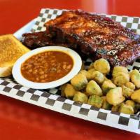 Ribs for 2 with 2 Sides & 2 Pieces of Texas Toast · A great meal to be shared! You get a full rack of our competition style baby back ribs split...