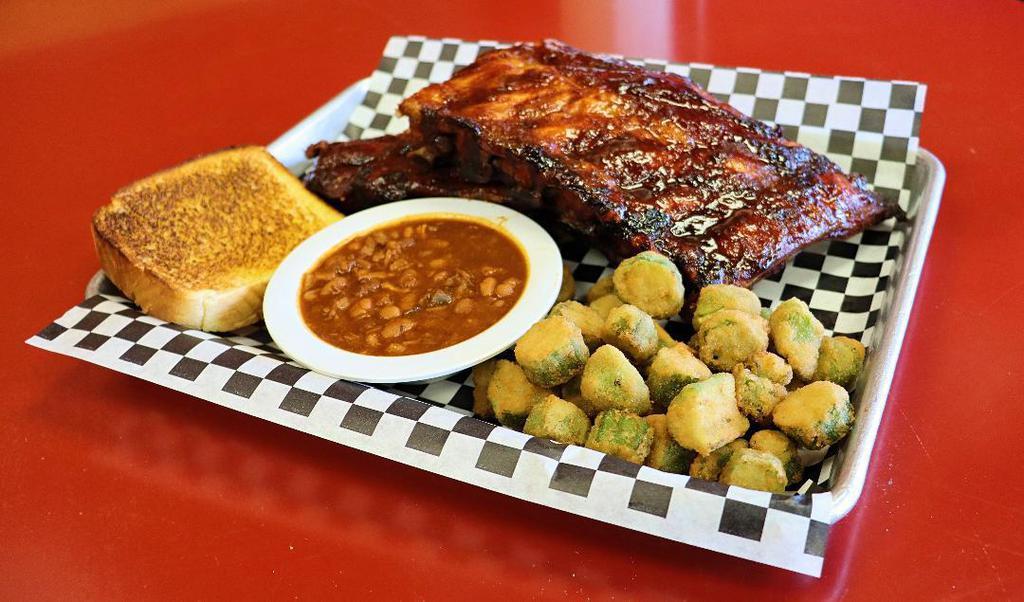 Ribs for 2 with 2 Sides & 2 Pieces of Texas Toast · A great meal to be shared! You get a full rack of our competition style baby back ribs split in half served with two sides of your choice and two pieces of Texas toast.