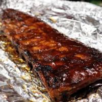 Loin Back Ribs · 1 whole slab of ribs, wet, dry or muddy, to go. Call ahead for more than 1 slab, and to chec...